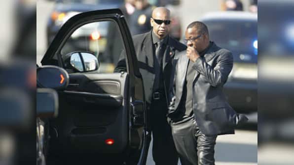Bobby Brown exits Houston's funeral, blames security
