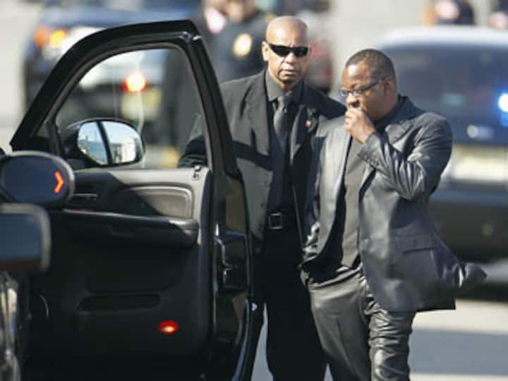 Bobby Brown exits Houston's funeral, blames security
