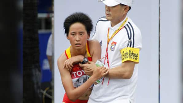China's Olympic runners raise chickens amid food fears - report