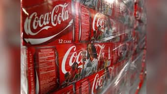 Coca-Cola profits 'solid', eyes cost savings