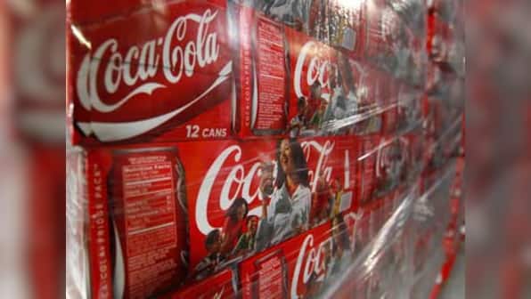 Coca-Cola profits 'solid', eyes cost savings