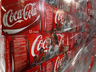 Coca-Cola profits 'solid', eyes cost savings Coca-Cola profits 'solid', eyes cost savings