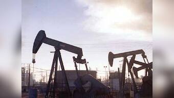 Oil prices jump to their highest in a month as US crude stocks fall, Middle East worries add support