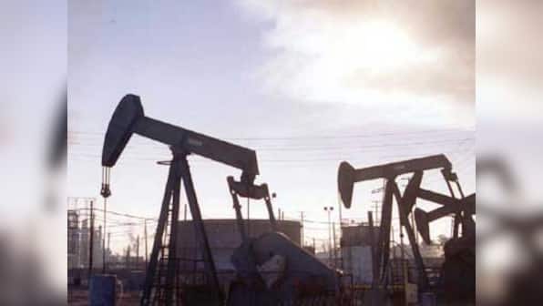 Oil prices jump to their highest in a month as US crude stocks fall, Middle East worries add support