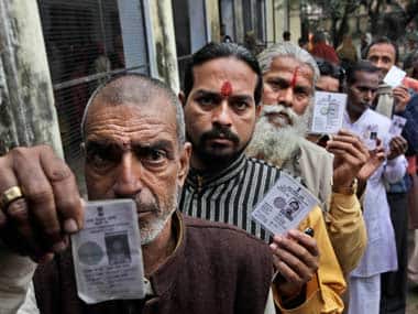 News Wrap: Porn scandal forces resignations; UP elections carry on