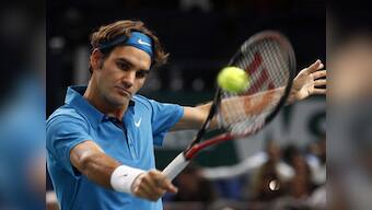 Federer comes through tough match in Rotterdam