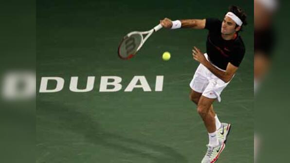 Federer eases through first round in Dubai