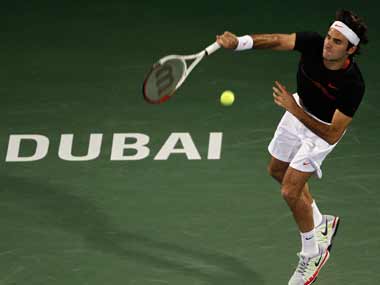 Federer eases through first round in Dubai Federer eases through first round in Dubai