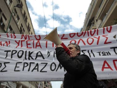 Greece to vote on tough salary, pension cuts  Greece to vote on tough salary, pension cuts