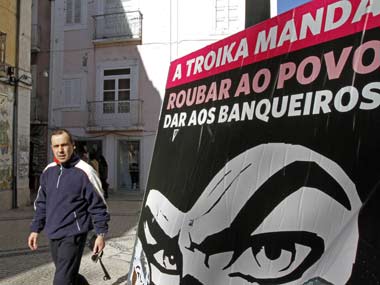 Greeks strike tentative bailout deal in time for EU meet Greeks strike tentative bailout deal in time for EU meet