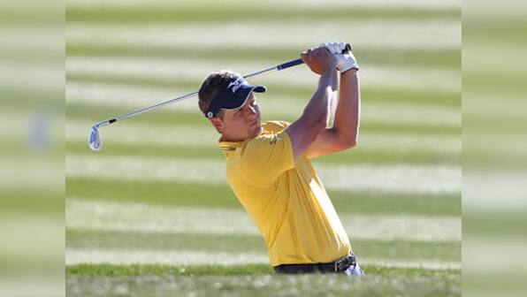 Top seed Donald exits, Tiger scrapes through