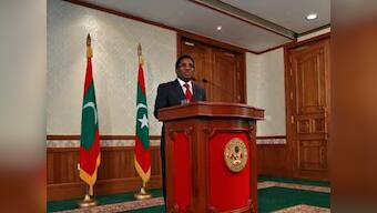 India backs Maldives leader as he agrees to early elections