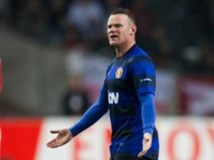 Throat infections forces Rooney to miss Ajax game