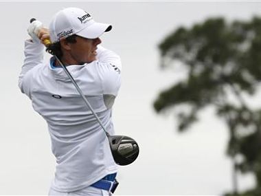 McIlroy holds off Tiger threat to take top golf spot McIlroy holds off Tiger threat to take top golf spot