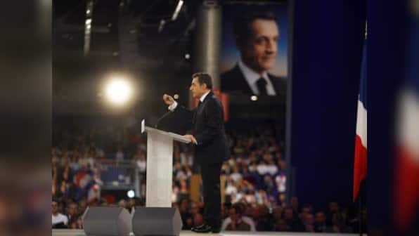 Sarkozy threatens French pullout of visa-free zone