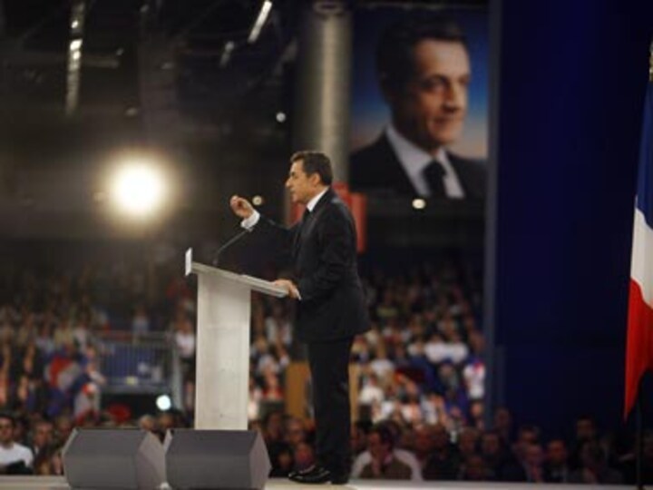 Sarkozy threatens French pullout of visa-free zone