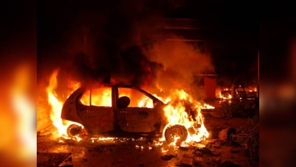 Violence in Gurgaon: Mob injures 17, torches 14 vehicles