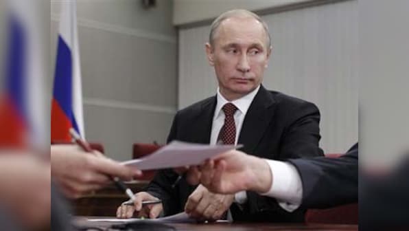 Russia's Putin seeks convincing return to Kremlin