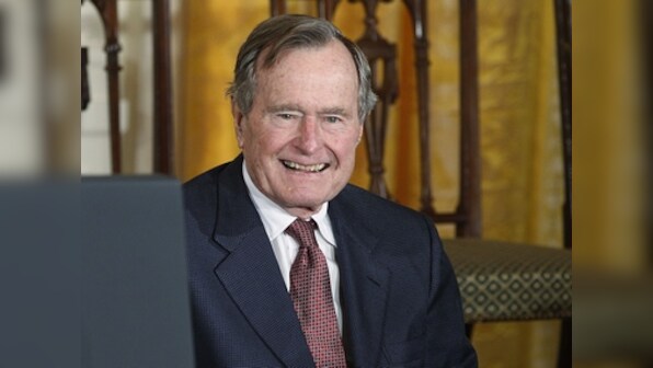 Former US President George HW Bush moved out of intensive care, making progress