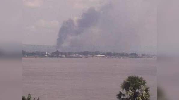 Rescuers try to keep fire from 2nd arms depot in Congo