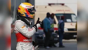 Hamilton gets pole position in Malaysia, HRT qualifies