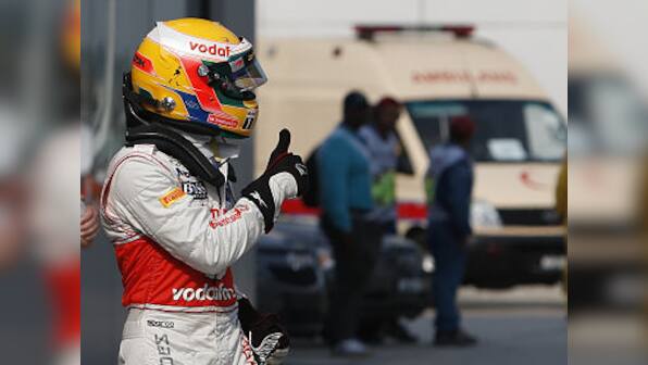 Hamilton gets pole position in Malaysia, HRT qualifies