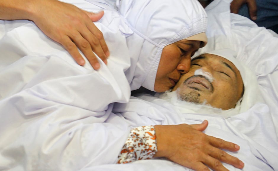 The Mother of Noramfaizul Mohd Nor, a Malaysian cameraman shot dead in the Somali capital, kisses her son, when his body arrives in Kuala Lumpur. Reuters The Mother of Noramfaizul Mohd Nor, a Malaysian cameraman shot dead in the Somali capital, kisses her son, when his body arrives in Kuala Lumpur. Reuters