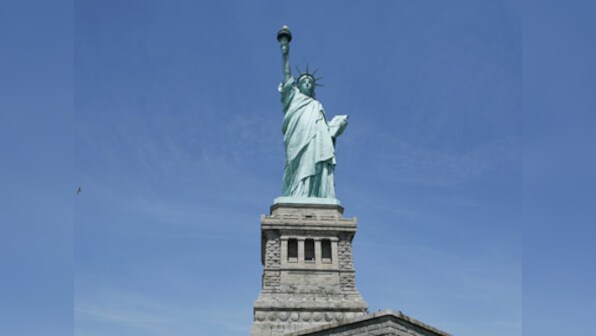 Police arrests woman who climbed base of Statue of Liberty to protest Donald Trump's 'zero tolerance' immigration policy