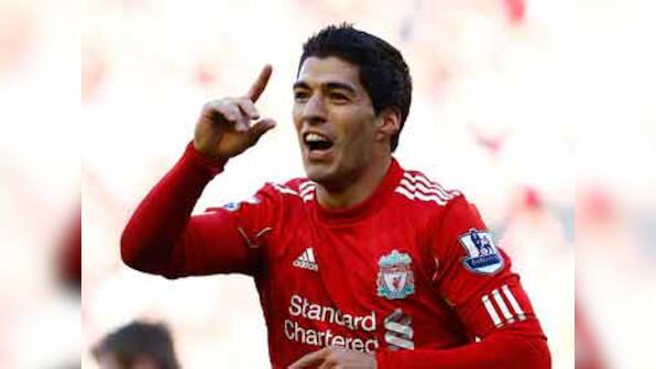Suarez keen to accept Liverpool contract extension