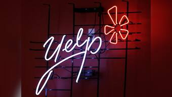 Questions loom as Yelp prices IPO at $15 a share 