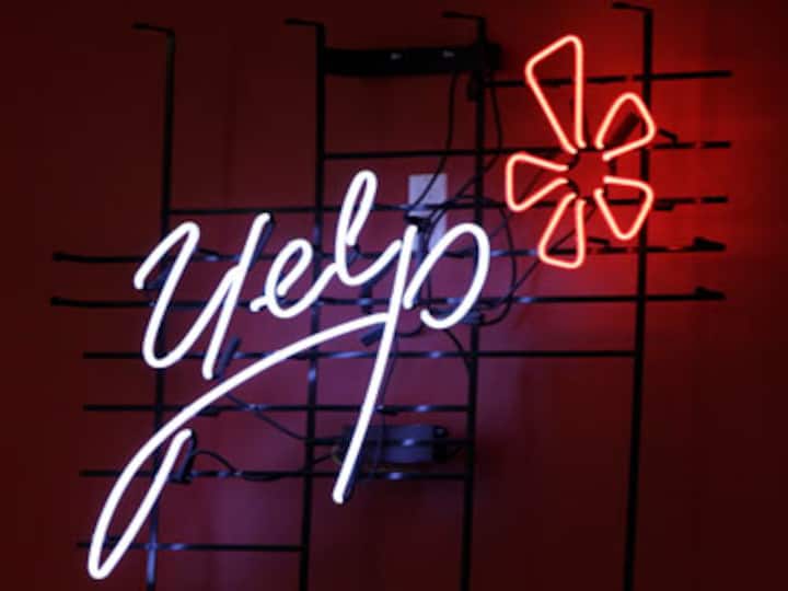 Questions loom as Yelp prices IPO at $15 a share 