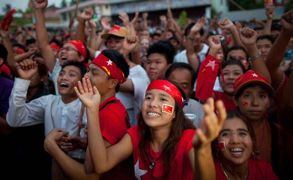 National League for Democracy (NLD) supporters celebrate their victory in the parliamentary elections outside the party headquarters on 1 April. Getty Images National League for Democracy (NLD) supporters celebrate their victory in the parliamentary elections outside the party headquarters on 1 April. Getty Images