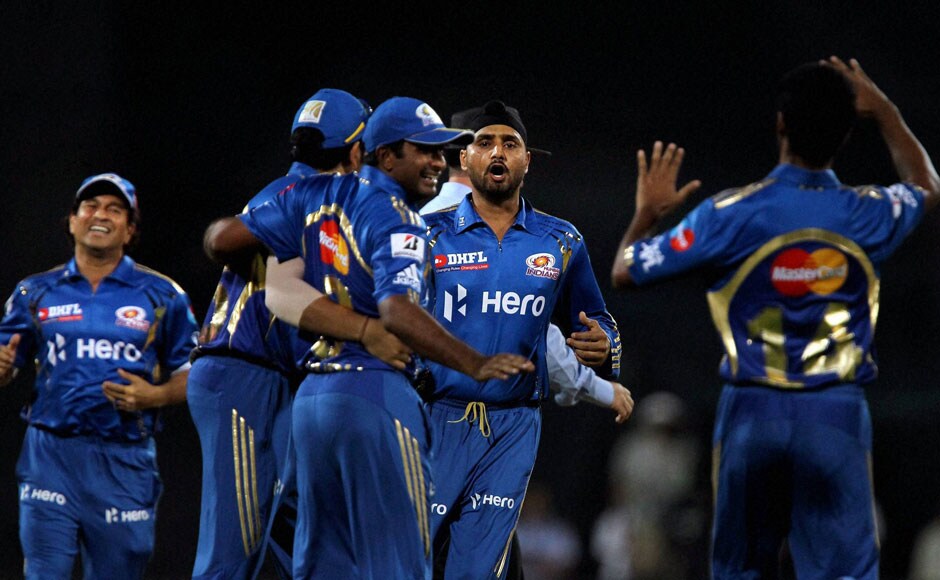 Harbhajan and other MI players celebrate another wicket. PTI Harbhajan and other MI players celebrate another wicket. PTI