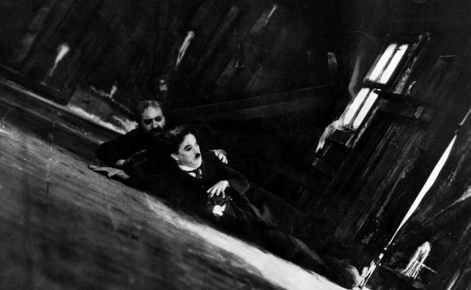 Charlie Chaplin and Mack Swain star in the silent classic film 'The Gold Rush', written, produced, directed by Charles Chaplin. Getty Images Charlie Chaplin and Mack Swain star in the silent classic film 'The Gold Rush', written, produced, directed by Charles Chaplin. Getty Images