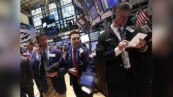 Wall St up on earnings but tech, banks weigh