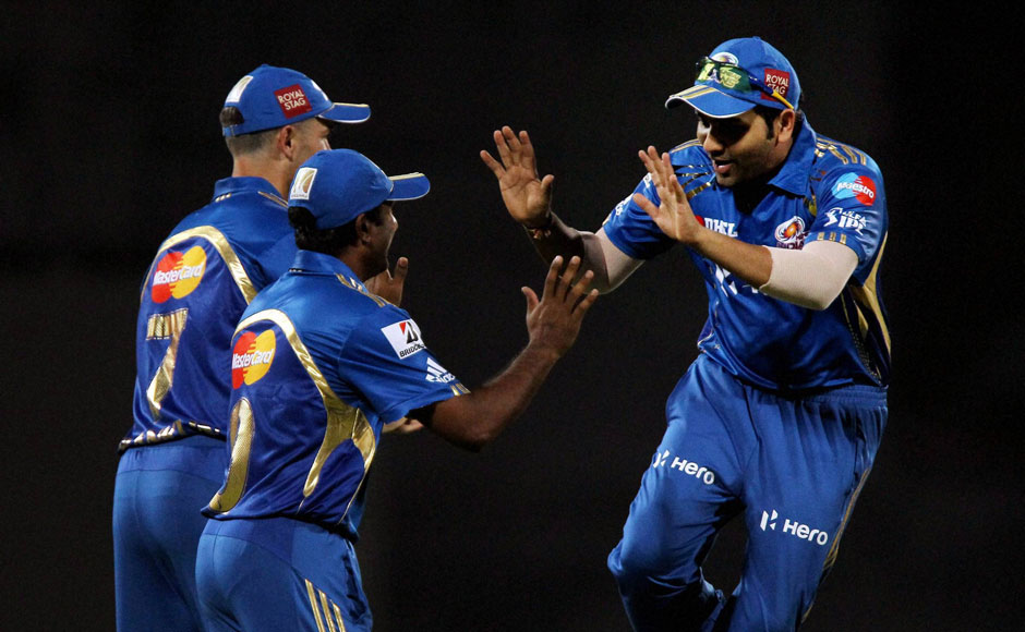 MI players celebrate another wicket. PTI MI players celebrate another wicket. PTI