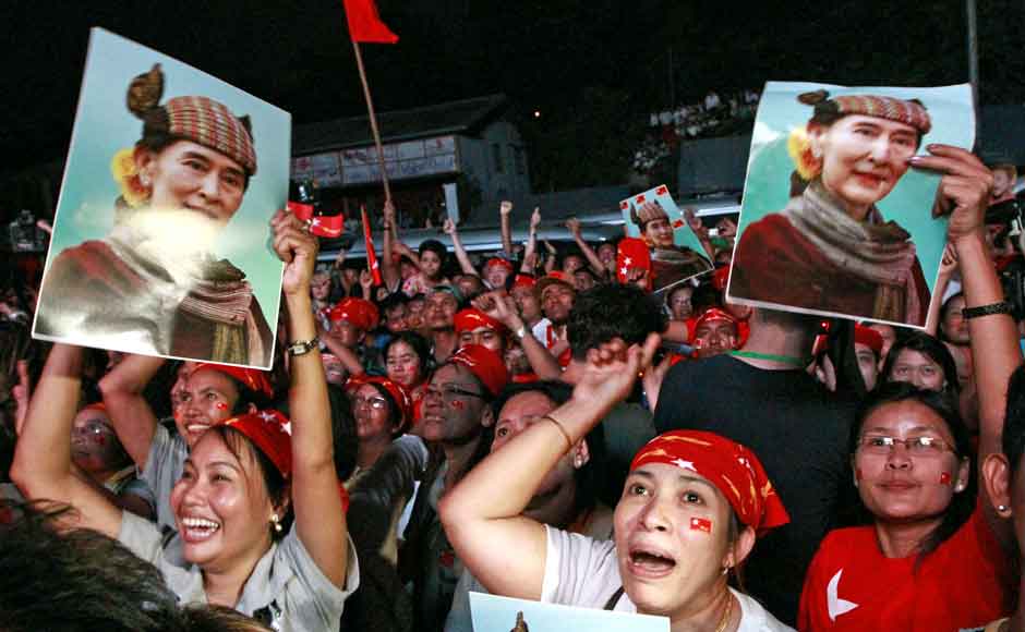 Aung San Suu Kyi's National League for Democracy supporters cheer after the party's announcement outside the party headquarters in Yangon, Myanmar. AP Aung San Suu Kyi's National League for Democracy supporters cheer after the party's announcement outside the party headquarters in Yangon, Myanmar. AP
