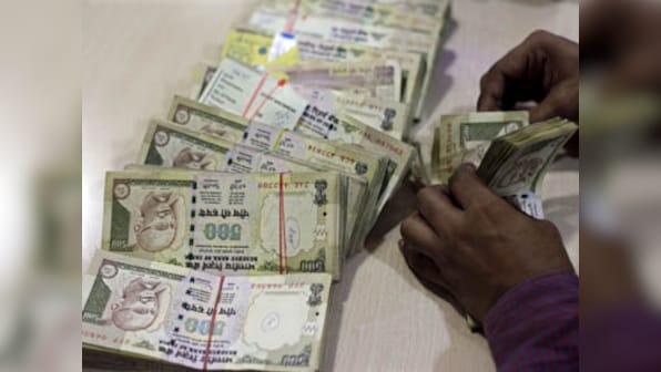 Experts see S&P downgrade put strain on Indian rupee