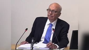 Leveson Inquiry: Murdoch's ex-editor Evans ridicules claims  