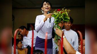 Suu Kyi's party will protect Myanmar's constitution, to attend parliament 