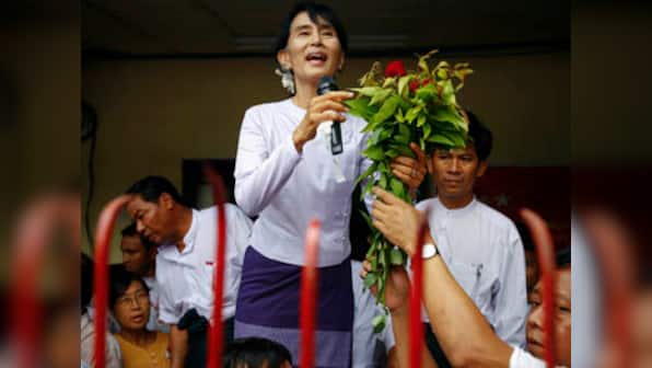 Suu Kyi's party will protect Myanmar's constitution, to attend parliament 