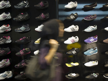 Adidas raises outlook, announces India probe  Adidas raises outlook, announces India probe