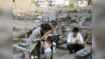 Japan's tsunami-hit town raises yellow handkerchiefs with wishes