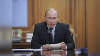 Putin steps down as ruling party chief