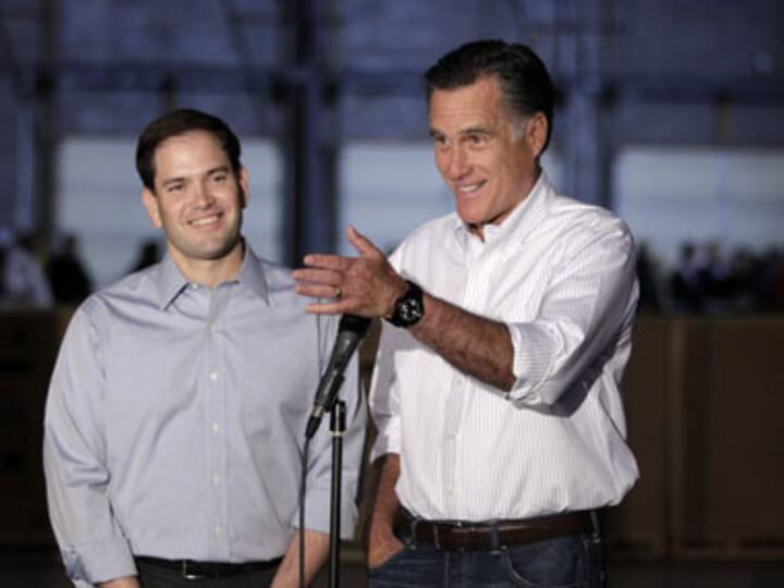 Romney shifting toward centre on big primary day 