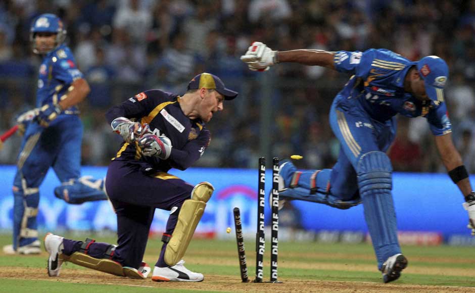 Kolkata Knight Riders wicketkeeper Mcullum attempts to run out Mumbai Indians K Pollard. PTI Kolkata Knight Riders wicketkeeper Mcullum attempts to run out Mumbai Indians K Pollard. PTI