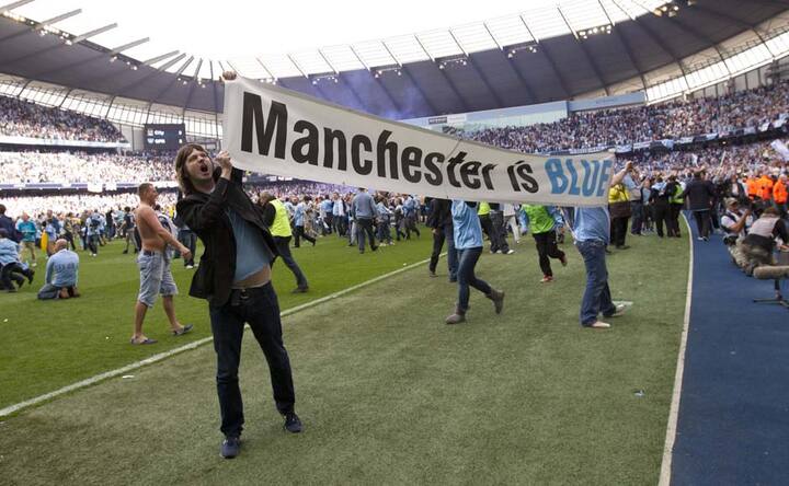 Images: Manchester is blue after City win EPL title 