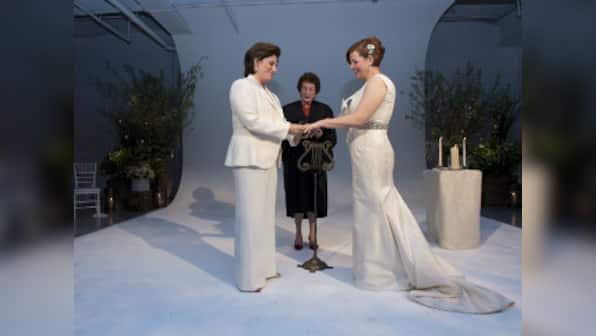NYC's openly gay senior Quinn weds lawyer partner