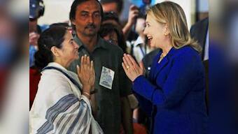 Back home, Clinton praises Mamata for ousting Left