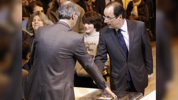 France's Hollande in first diplomatic test with Obama